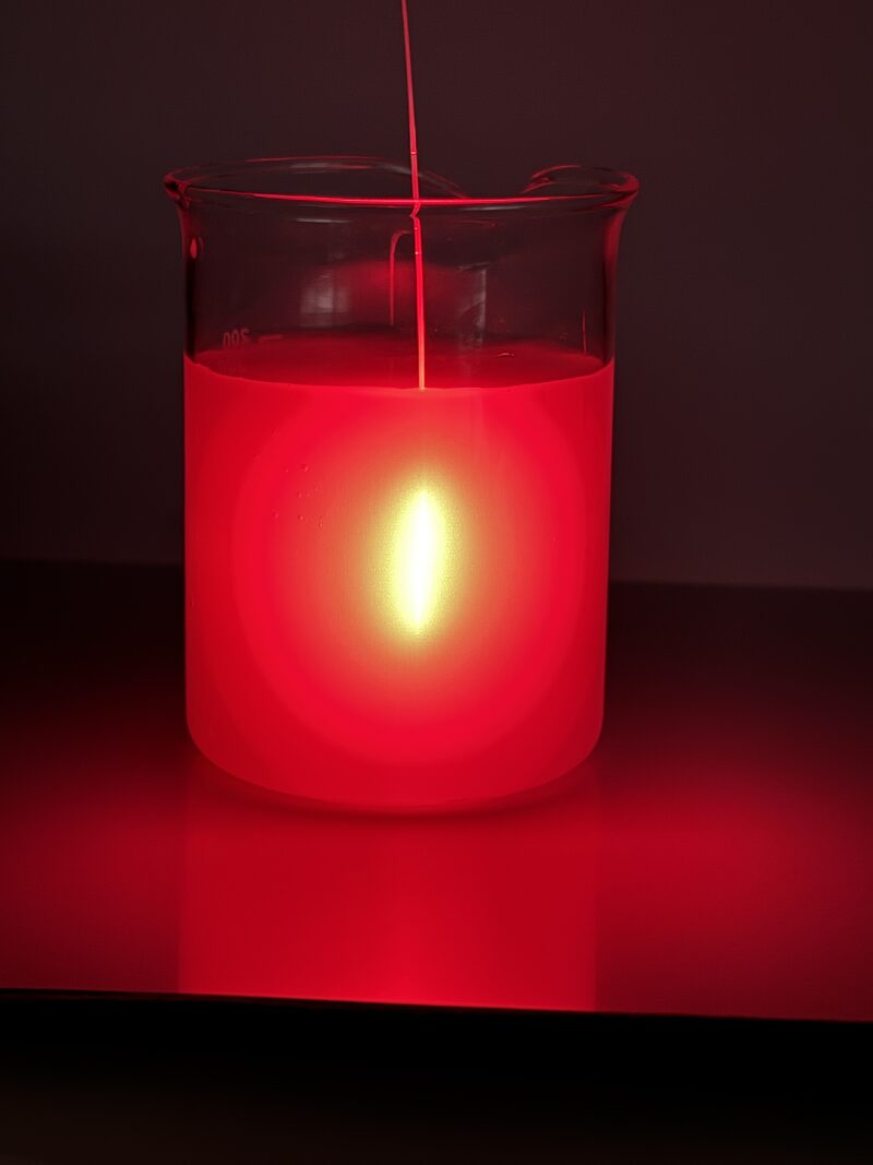 Cylindrical diffuser emitting 660 nm red light in a vessel with scattering medium
